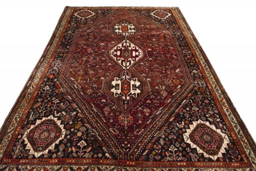 Surface texture of 2000s Ghashghai rug with natural Wool and intricate pattern