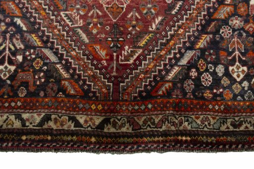 Central medallion detail of 2000s Ghashghai rug from Iran / Persia