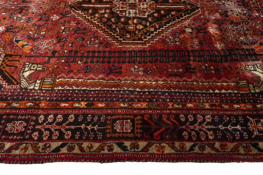 Full view of 2000s Ghashghai rug from Iran / Persia, 245 × 155 cm in Red tones