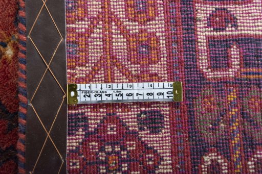 Close-up detail of 2000s Ghashghai rug from Iran / Persia showing Wool weave