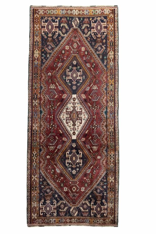 Full view of 2000s Ghashghai rug from Iran / Persia, 282 × 118 cm in Red tones