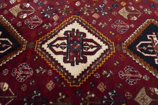 Central medallion detail of 2000s Ghashghai rug from Iran / Persia