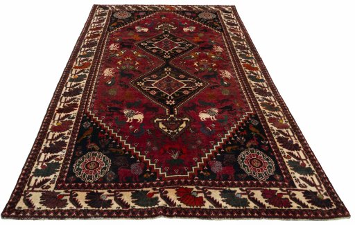 Surface texture of 2000s Ghashghai rug with natural Wool and intricate pattern