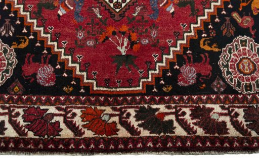 Central medallion detail of 2000s Ghashghai rug from Iran / Persia