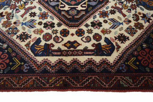 Corner detail of 2000s Ghashghai rug showing border pattern and Wool pile