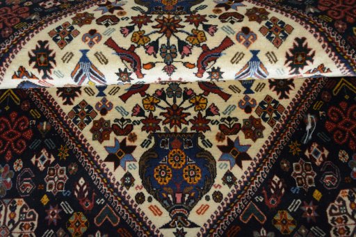 Close-up detail of 2000s Ghashghai rug from Iran / Persia showing Wool weave
