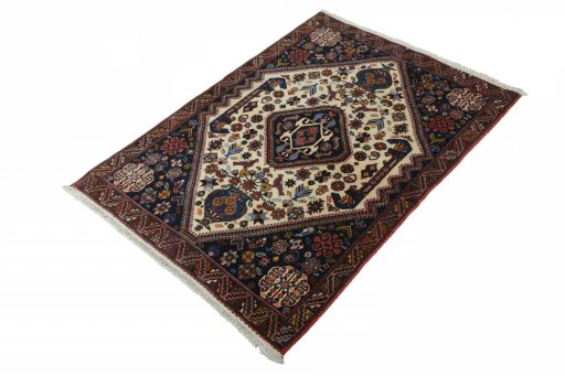 Corner detail of 2000s Ghashghai rug showing border pattern and Wool pile