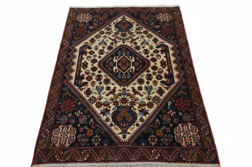 Surface texture of 2000s Ghashghai rug with natural Wool and intricate pattern