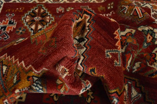 Corner detail of 2000s Ghashghai rug showing border pattern and Wool pile