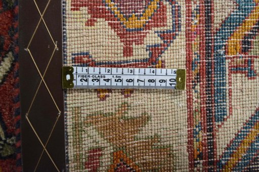 Surface texture of 2000s Ghashghai rug with natural Wool and intricate pattern