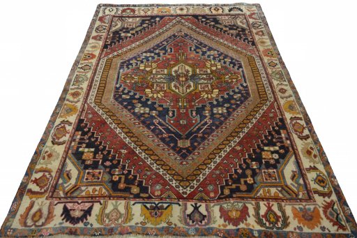Surface texture of 2000s Ghashghai rug with natural Wool and intricate pattern