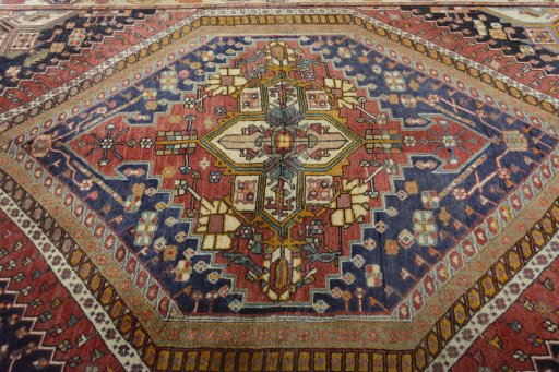 Central medallion detail of 2000s Ghashghai rug from Iran / Persia