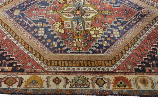 Full view of 2000s Ghashghai rug from Iran / Persia, 224 × 150 cm in Multi Color tones