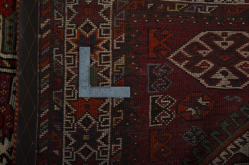 Close-up detail of 1950s Ghashghai rug from Iran / Persia showing Wool weave