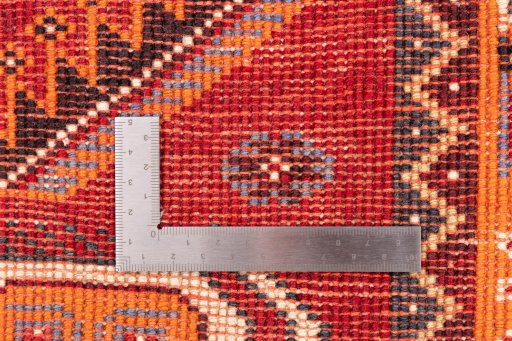 Corner detail of 1994s Ghashghai rug showing border pattern and Wool pile