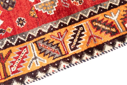 Backside of handmade 1994s Ghashghai rug showing knot structure and weave density