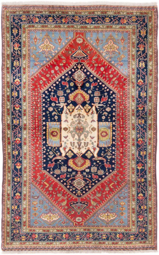 Full view of 1984s Ghashghai rug from Iran / Persia, 197 × 123 cm in Multi Color tones