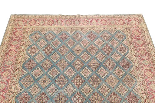 Surface texture of 1920s Hamedan rug with natural Wool and intricate pattern