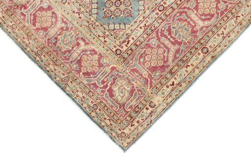 Backside of handmade 1920s Hamedan rug showing knot structure and weave density