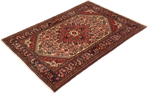 Corner detail of 1940s Hamedan rug showing border pattern and Wool pile