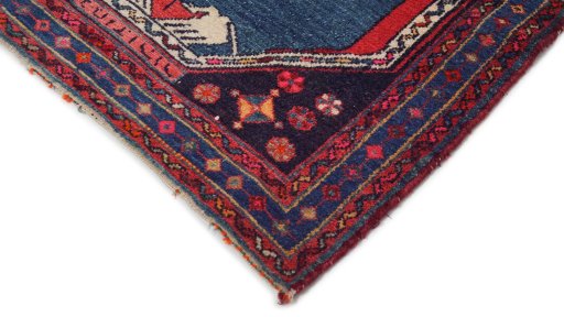 Surface texture of 1950s Hamedan rug with natural Wool and intricate pattern