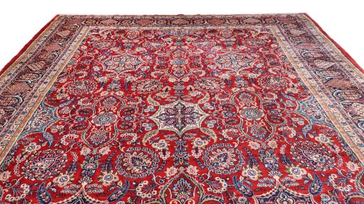 Surface texture of 1910s Hamedan rug with natural Wool and intricate pattern