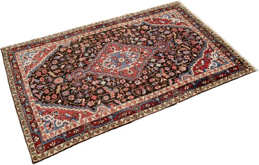 Corner detail of 1950s Hamedan rug showing border pattern and Wool pile