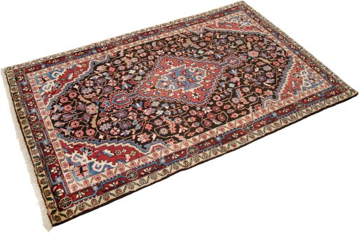 Close-up detail of 1950s Hamedan rug from Iran / Persia showing Wool weave