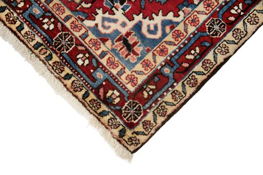 Backside of handmade 1950s Hamedan rug showing knot structure and weave density