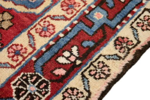 Close-up detail of 1950s Hamedan rug from Iran / Persia showing Wool weave