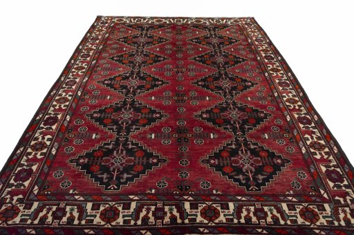 Surface texture of 2000s Hamedan rug with natural Wool and intricate pattern