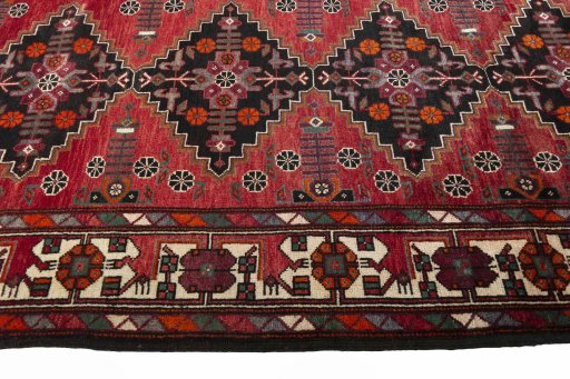 Close-up detail of 2000s Hamedan rug from Iran / Persia showing Wool weave