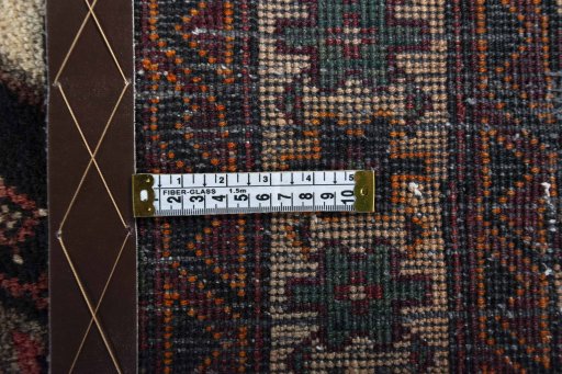 Close-up detail of 2000s Hamedan rug from Iran / Persia showing Wool weave