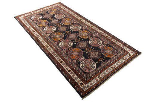 Close-up detail of 2000s Hamedan rug from Iran / Persia showing Wool weave