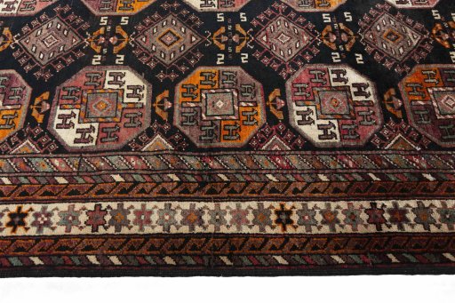 Close-up detail of 2000s Hamedan rug from Iran / Persia showing Wool weave