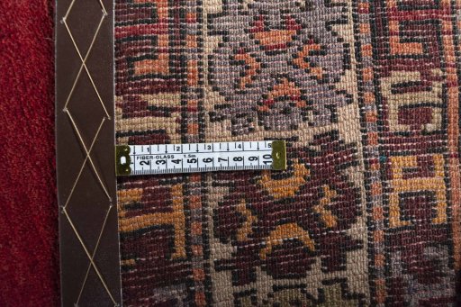 Backside of handmade 2000s Hamedan rug showing knot structure and weave density