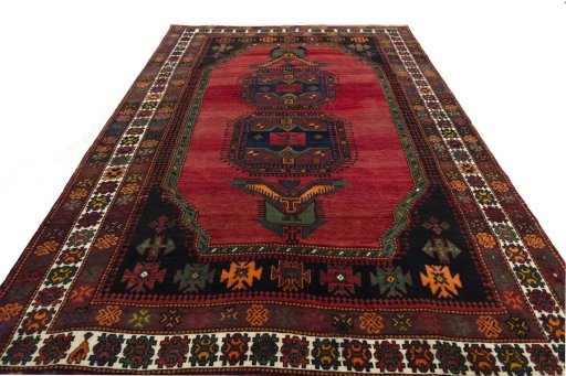 Surface texture of 2000s Hamedan rug with natural Wool and intricate pattern