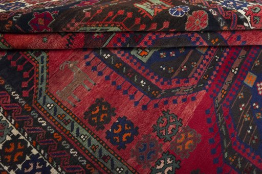 Close-up detail of 2000s Hamedan rug from Iran / Persia showing Wool weave