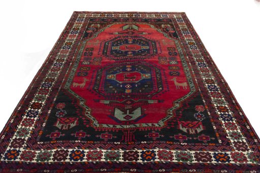 Surface texture of 2000s Hamedan rug with natural Wool and intricate pattern