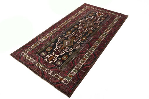 Corner detail of 2000s Hamedan rug showing border pattern and Wool pile