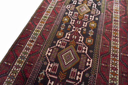 Backside of handmade 2000s Hamedan rug showing knot structure and weave density