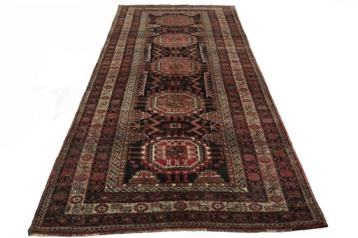 Surface texture of 2000s Hamedan rug with natural Wool and intricate pattern