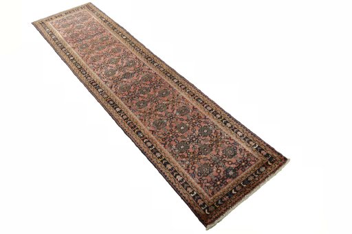 Close-up detail of 2000s Hamedan rug from Iran / Persia showing Wool weave