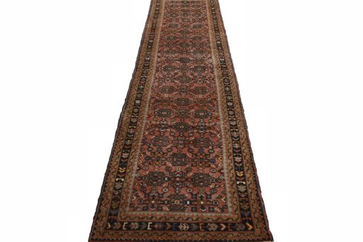 Surface texture of 2000s Hamedan rug with natural Wool and intricate pattern