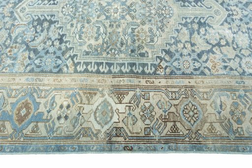 Corner detail of 1950s Hamedan rug showing border pattern and Wool pile