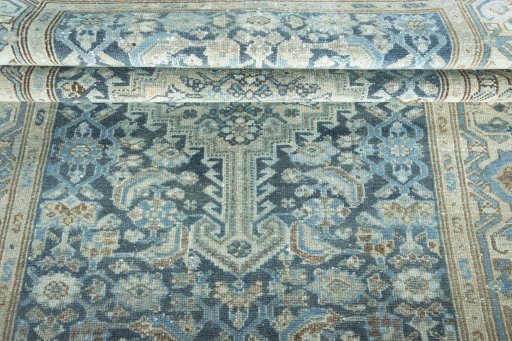 Close-up detail of 1950s Hamedan rug from Iran / Persia showing Wool weave