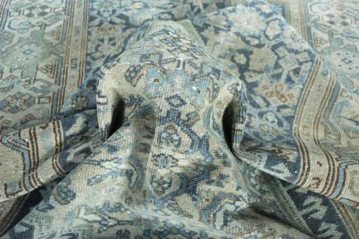 Surface texture of 1950s Hamedan rug with natural Wool and intricate pattern