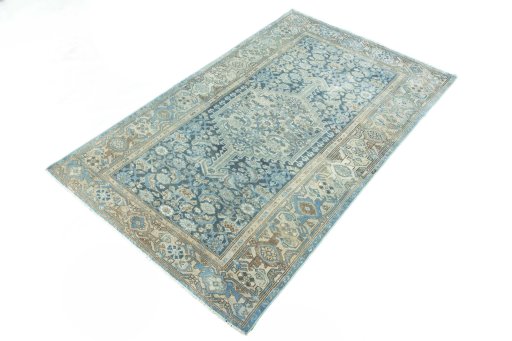 Corner detail of 1950s Hamedan rug showing border pattern and Wool pile