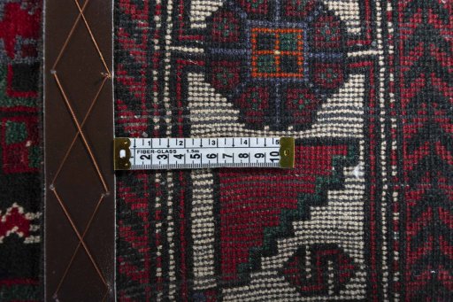 Close-up detail of 2000s Hamedan rug from Iran / Persia showing Wool weave