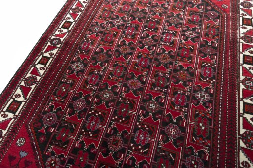 Backside of handmade 2000s Hamedan rug showing knot structure and weave density